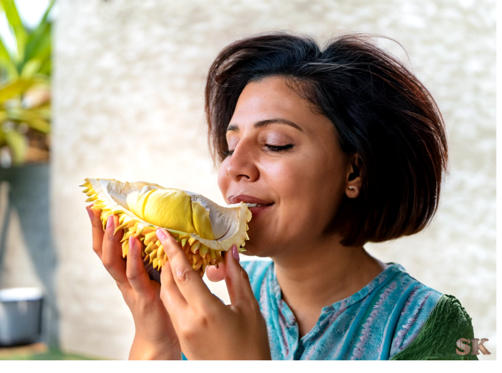 person eating durian fruit