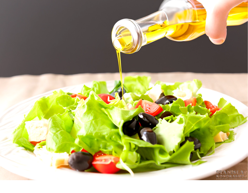 putting olive oil on salad