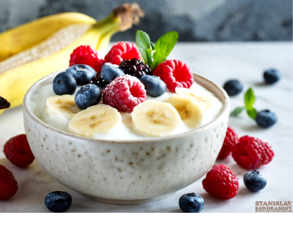 banana and berries on yogurt
