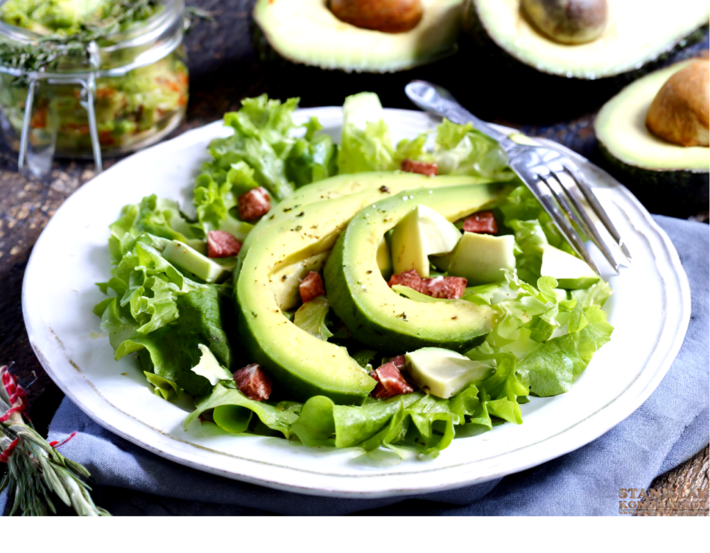 sliced avocado on salad